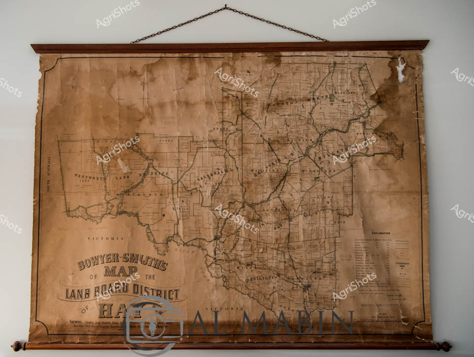 Bovyer Smythe's meticulously preserved historical land board district map of Victoria captures a fascinating cartographic snapshot of rural administrative boundaries in the late 19th century. The weathered sepia-toned document, mounted in an elegant wooden frame and suspended by a delicate chain, reveals intricate township subdivisions, pastoral regions, and geographical demarcations across what appears to be a significant agricultural landscape. Delicate lines and precise handwritten annotations chronicle the complex land management systems of the era, with each county and district carefully delineated in exquisite detail. The map's aged patina - featuring subtle brown water stains, subtle paper creases, and soft edges - speaks to its historical significance and careful preservation. Positioned against a neutral background, this archival treasure provides a compelling visual narrative of Victoria's rural development, offering contemporary viewers a window into the systematic land allocation and agricultural planning of a pivotal period in Australian territorial expansion. An extraordinary research document that transforms geographical data into a compelling artistic artifact of colonial administrative heritage.